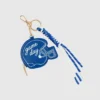 Colgante para bolso con forma de casco de Shiraleah