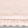 Conjunto de jerséu con bordes festoneados para bebé