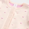 Conjunto de jerséu y cardigan para bebé