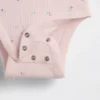 Conjunto de pantalones cortos y body «Grow-With-Me» de Tinyrib para bebé