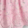 Conjunto de ropa para bebé con ojales