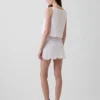 Faldita-pantalón mini con ojales