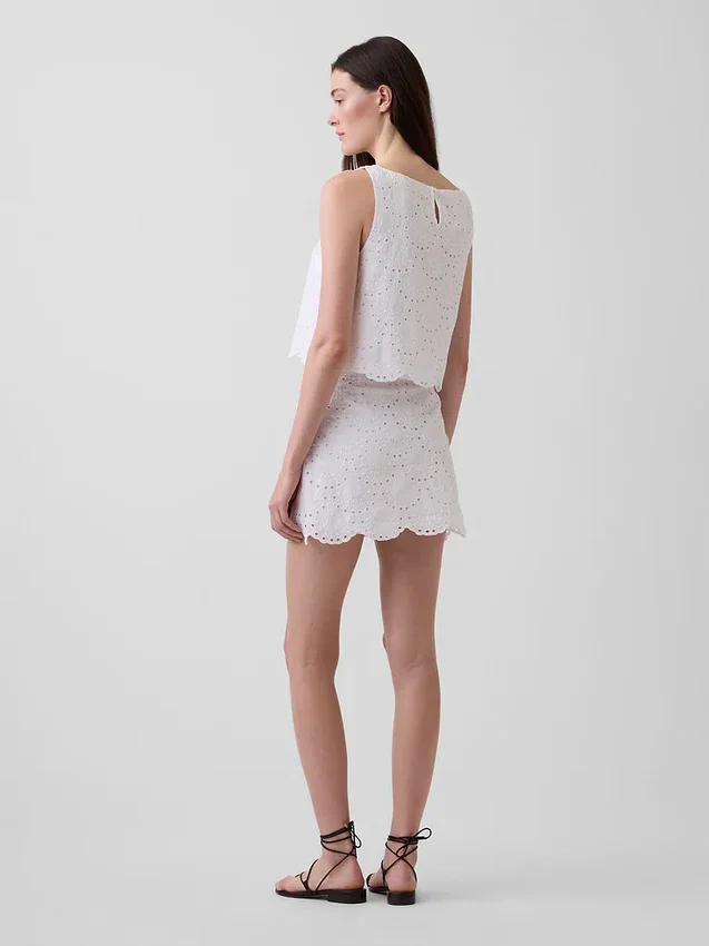 Faldita-pantalón mini con ojales