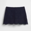Faldita-pantalón mini con ojales