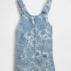 Faldón de mezclilla con estampado floral para niños