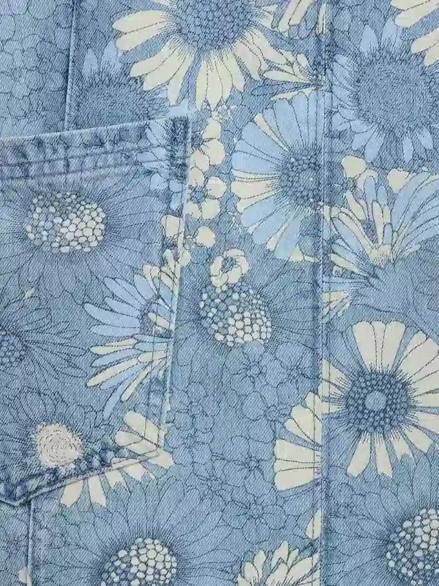 Faldón de mezclilla con estampado floral para niños