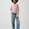 Jerséu infantil de ganchillo oversize con estampado