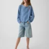 Jerséu infantil de ganchillo oversize con estampado