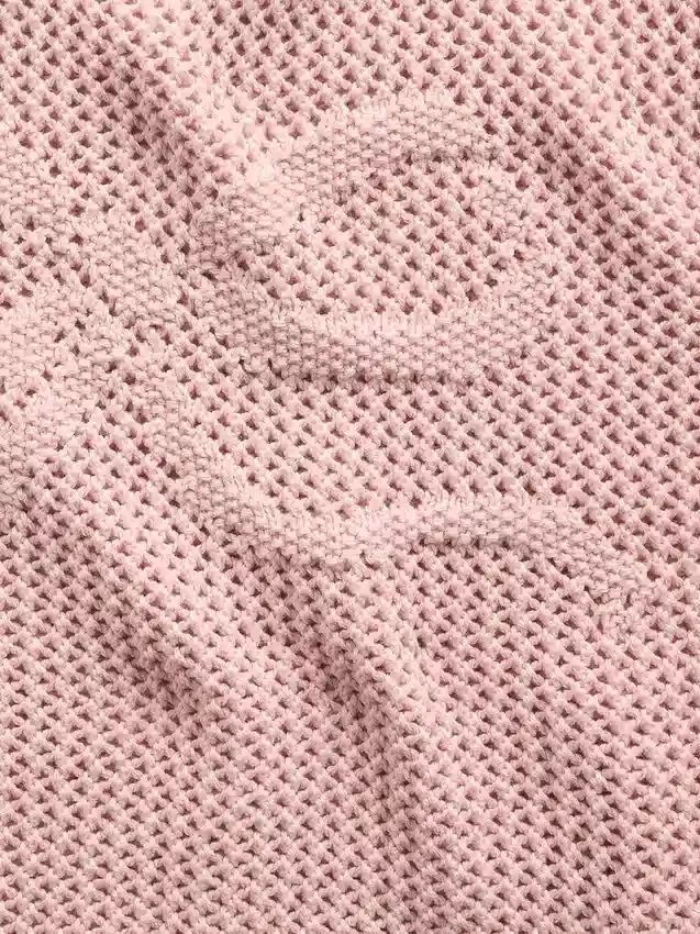 Jerséu infantil de ganchillo oversize con estampado