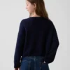 Jerséu infantil de ganchillo oversize con motivos americanos