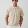 Jerséu polo oversize con bolsillo y cremallera de un cuarto