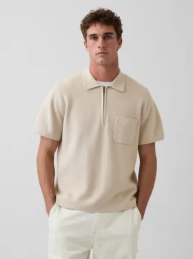 Jerséu polo oversize con bolsillo y cremallera de un cuarto