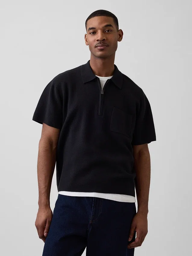 Jerséu polo oversize con bolsillo y cremallera de un cuarto