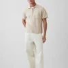 Jerséu polo oversize con bolsillo y cremallera de un cuarto