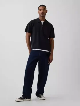 Jerséu polo oversize con bolsillo y cremallera de un cuarto