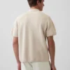 Jerséu polo oversize con bolsillo y cremallera de un cuarto