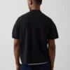 Jerséu polo oversize con bolsillo y cremallera de un cuarto