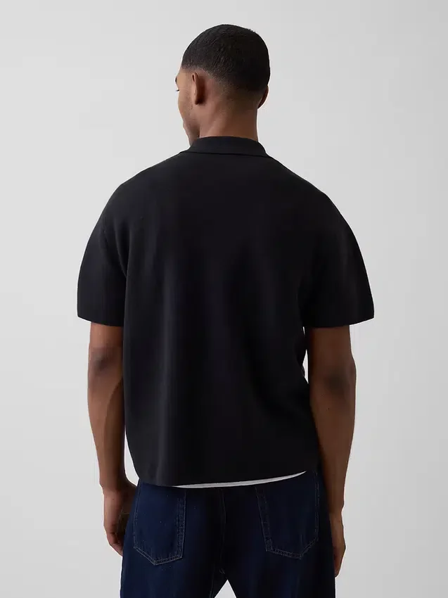 Jerséu polo oversize con bolsillo y cremallera de un cuarto