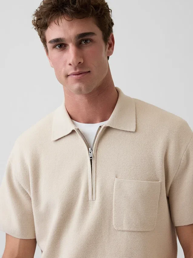 Jerséu polo oversize con bolsillo y cremallera de un cuarto