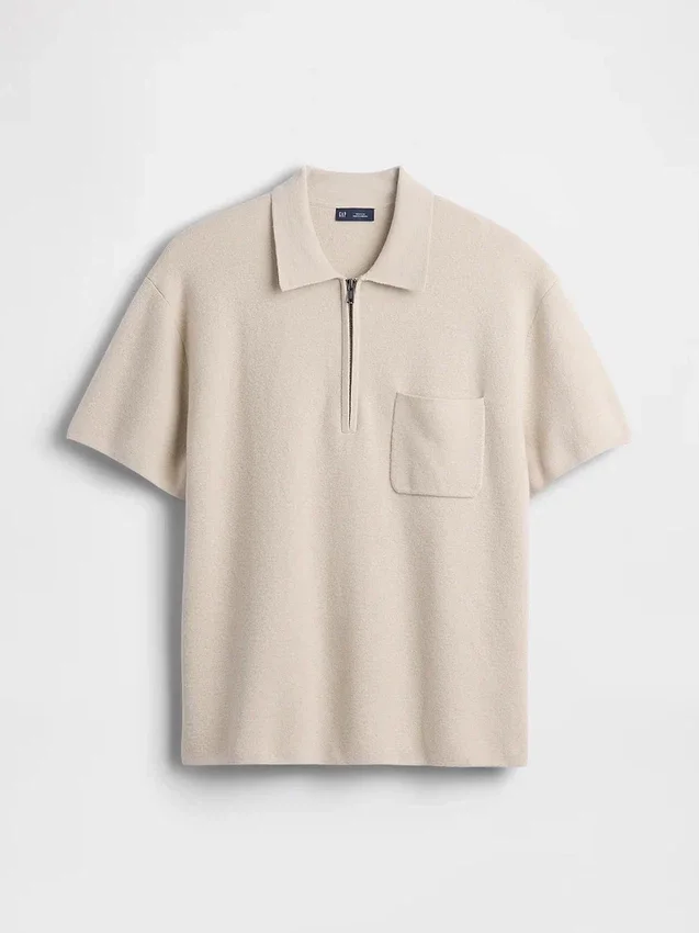 Jerséu polo oversize con bolsillo y cremallera de un cuarto
