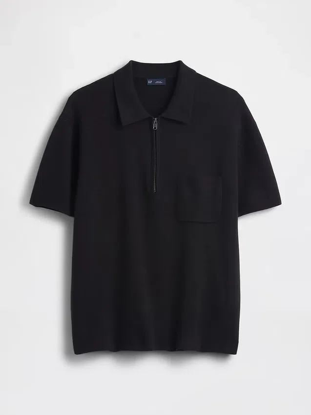 Jerséu polo oversize con bolsillo y cremallera de un cuarto