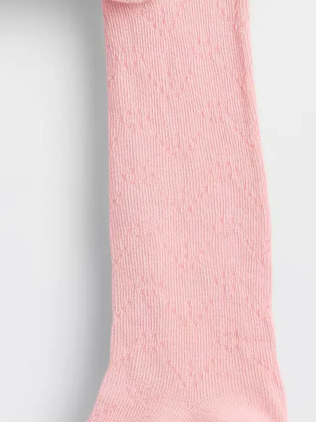 Medias con osito en punto calado para bebés y niños pequeños