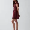 Mini vestido con cuello redondo y ribete de encaje