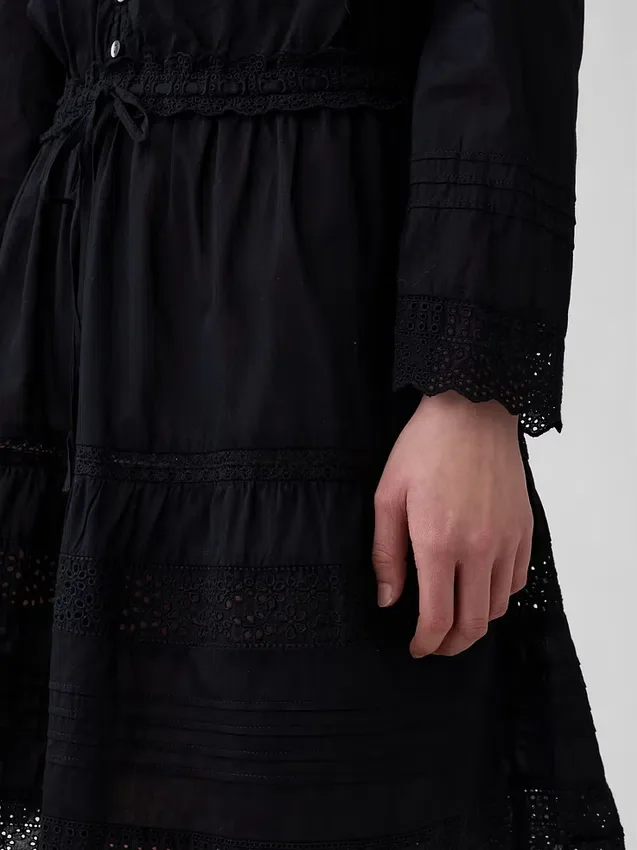 Mini vestido con ribete de encaje