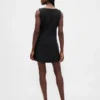 Minivestido con botones delanteros de tejido bistretch