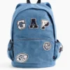 Mochila infantil de mezclilla con parches de logotipos