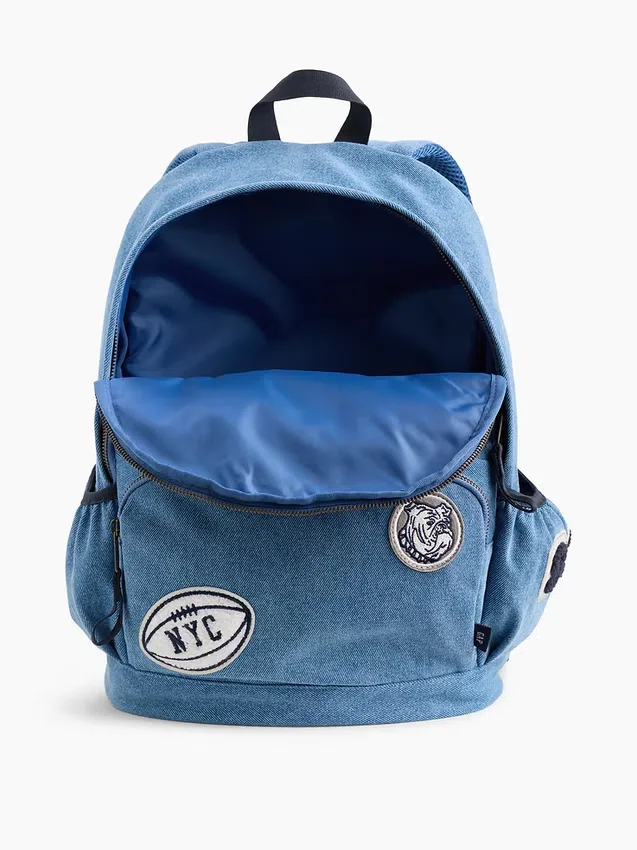 Mochila infantil de mezclilla con parches de logotipos