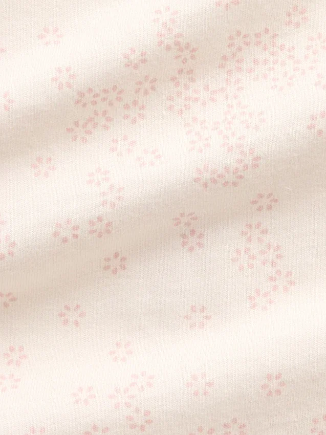 Mono con pies de algodón orgánico con estampado floral para bebé