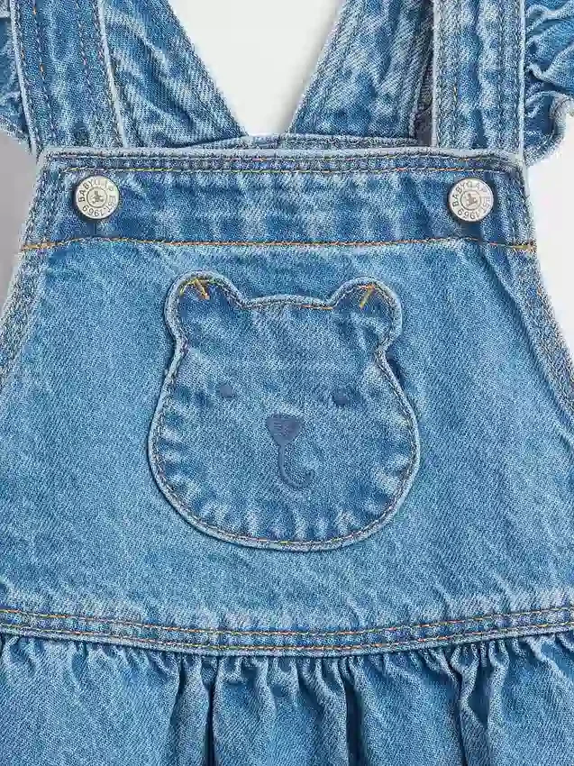 Overol de mezclilla con bolsillo de osito para bebés y niños