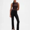 Pantalones acampanados de doble tejido con tiro alto y dobladillo abierto