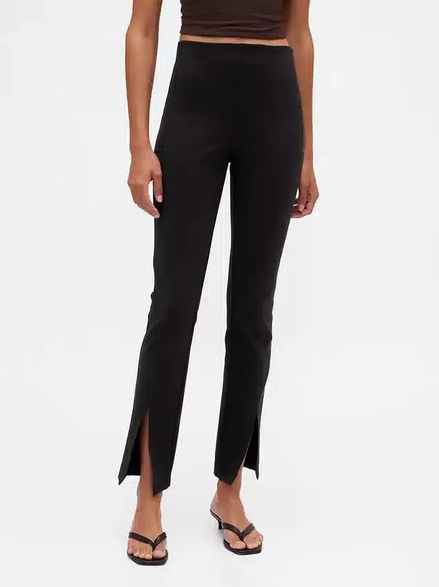 Pantalones acampanados de doble tejido con tiro alto y dobladillo abierto