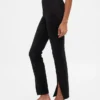 Pantalones acampanados de doble tejido con tiro alto y dobladillo abierto