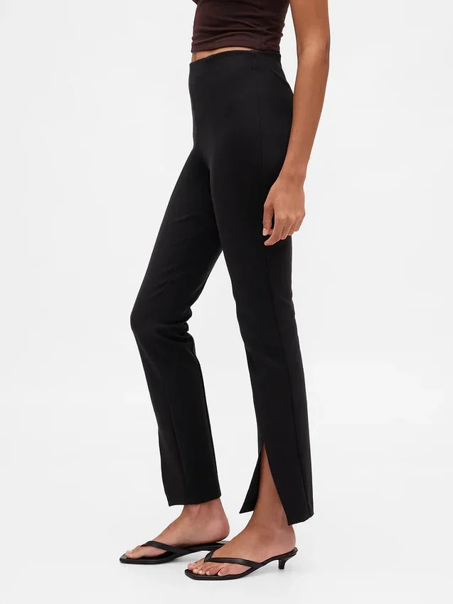Pantalones acampanados de doble tejido con tiro alto y dobladillo abierto