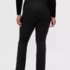 Pantalones acampanados de doble tejido con tiro alto y dobladillo abierto