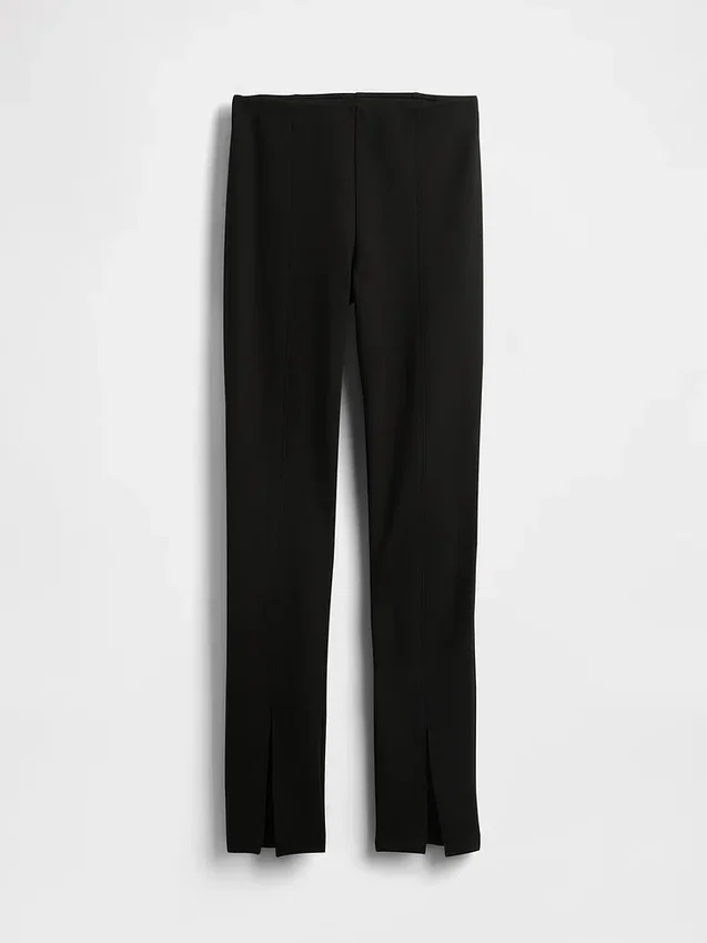 Pantalones acampanados de doble tejido con tiro alto y dobladillo abierto