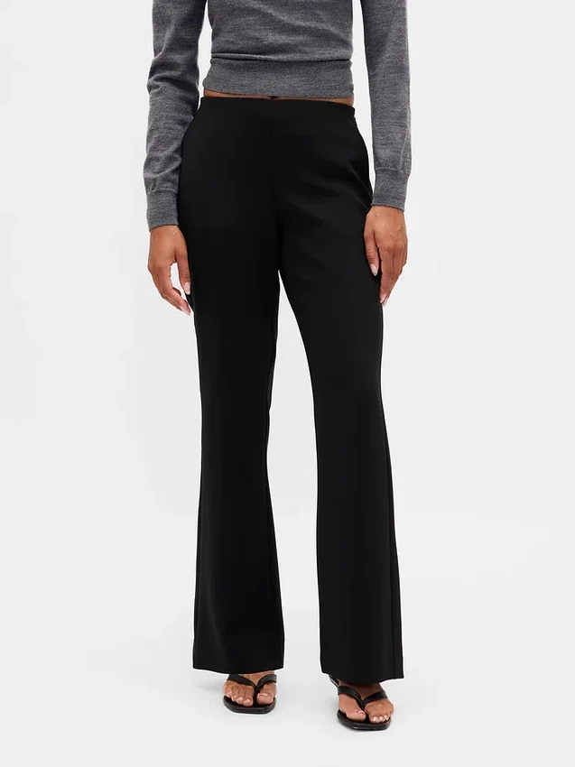 Pantalones acampanados de sarga de talle bajo