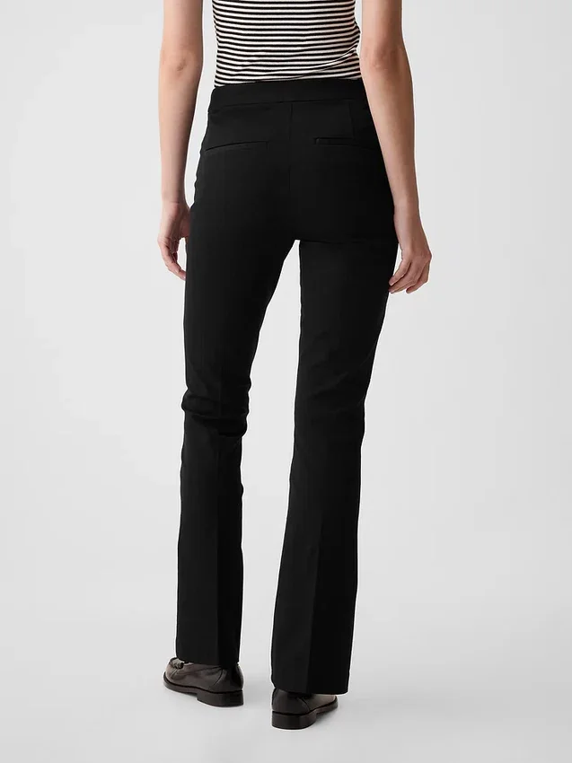 Pantalones acampanados de talle alto con tejido elástico en dos direcciones