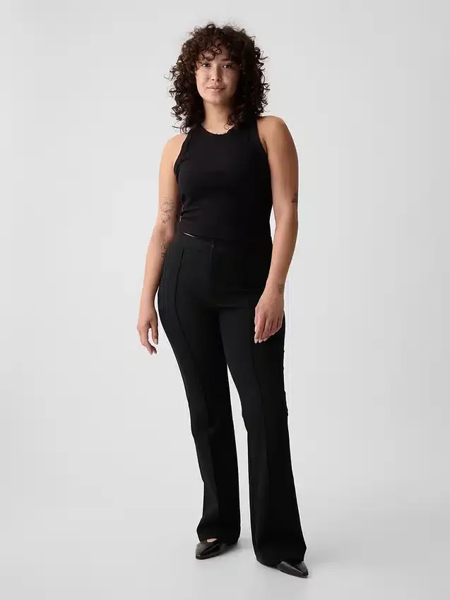 Pantalones acampanados de talle alto con tejido elástico en dos direcciones