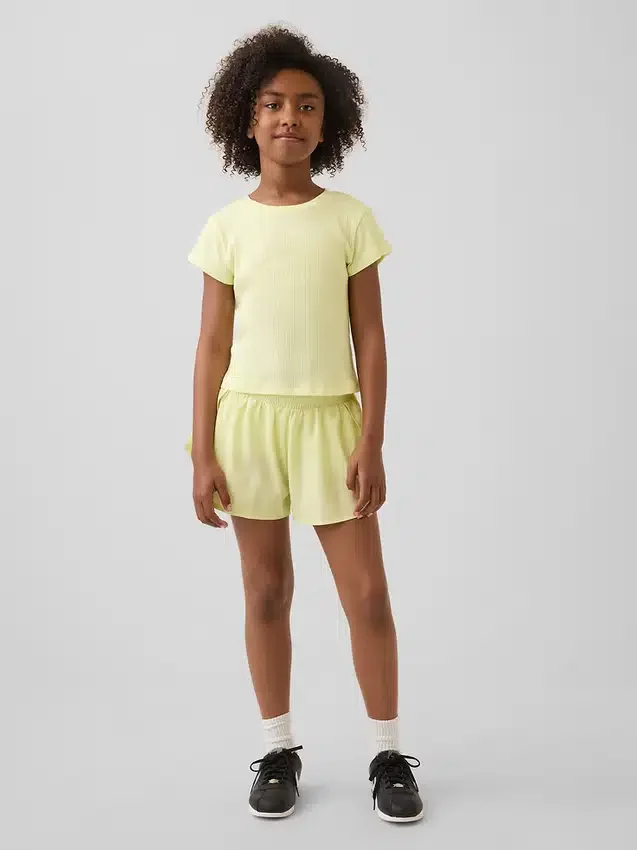 Pantalones cortos de correr para niños de secado rápido con dobladillo de mariposa