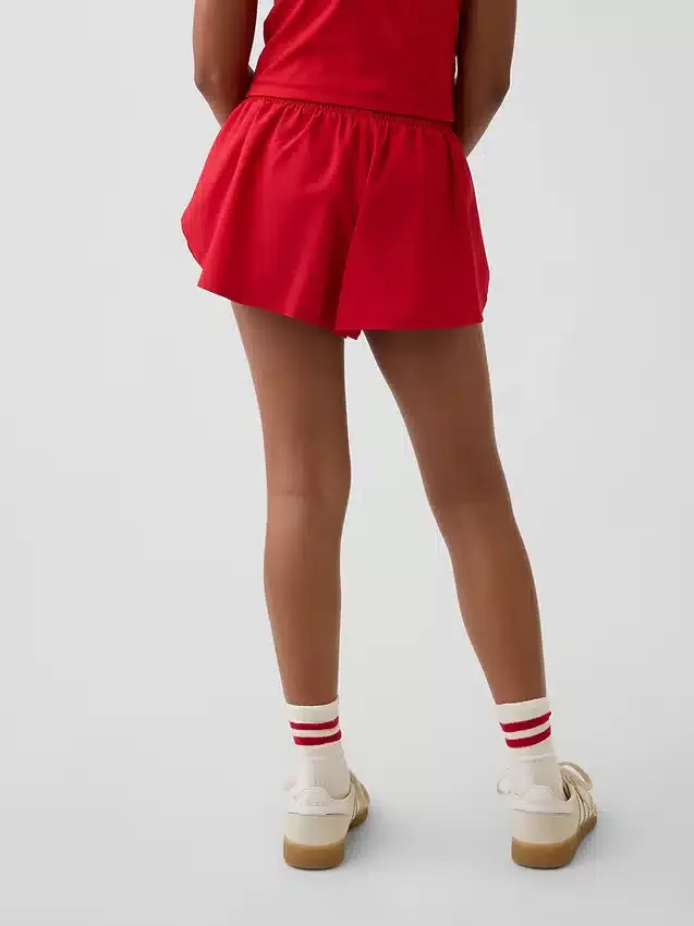 Pantalones cortos de correr para niños de secado rápido con dobladillo de mariposa