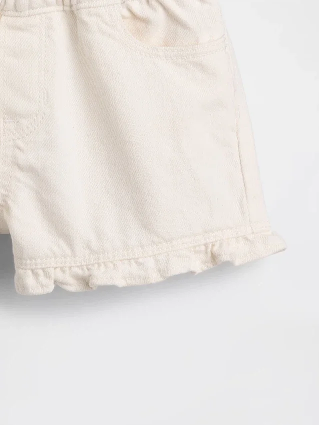 Pantalones cortos de mezclilla con volantes y abertura frontal para bebés y niños pequeños