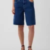 Pantalones cortos de mezclilla de talle medio y corte largo