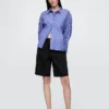 Pantalones cortos de mezclilla de talle medio y corte largo de 11"