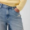Pantalones cortos de mezclilla holgados de talle medio de 8"