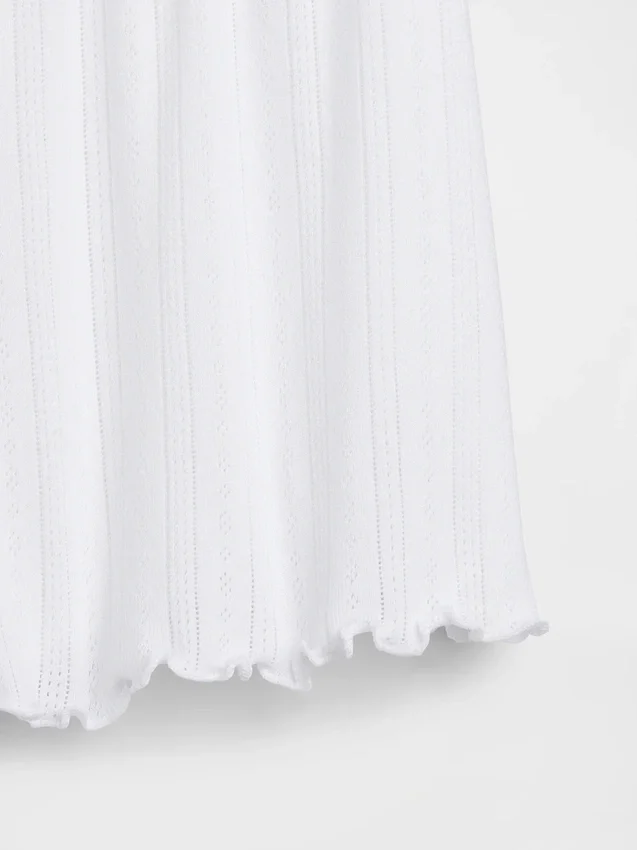 Pantalones cortos de pijama de punto pointelle con dobladillo ondulado