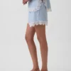 Pantalones cortos de talle medio de 4" con ribete de encaje y mezcla de lino